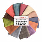 Carmon's Quilt Shop Figo Studio Space Dye fat quarter bundle featuring 13 colorful textured fabric pieces in a circle