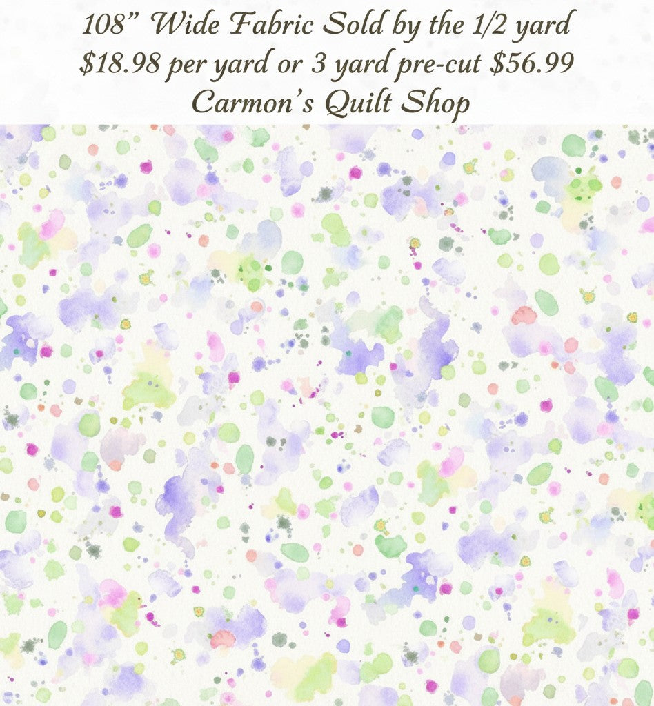Carmon's Quilt Shop 108 inch wide cotton backing fabric featuring a colorful paint splatter pattern on white
