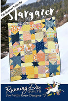 Carmon's Quilt Shop Stargazer quilt pattern featuring a colorful star design made from fat quarters in a snowy setting