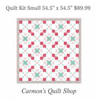 Carmon's Quilt Shop Starry-Eyed floral quilt kit in pink and green 100% cotton fabric with a geometric star pattern.