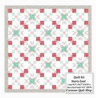 Carmon's Quilt Shop Starry-Eyed quilt kit featuring floral 100% cotton fabric in pink, green, and white patterns.
