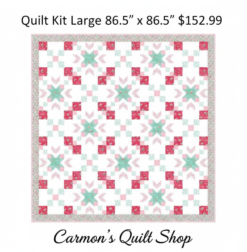 Carmon's Quilt Shop Starry-Eyed floral quilt kit in pink and teal 100% cotton fabric with a geometric star pattern.