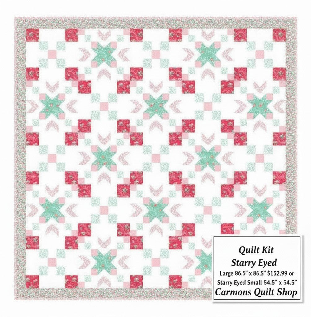 Carmon's Quilt Shop Starry-Eyed quilt kit featuring floral pink and green cotton fabric in a geometric star pattern.