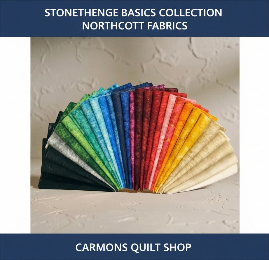 Carmon's Quilt Shop Stonehenge Basics Northcott fabric fan featuring a vibrant spectrum of cotton quilting colors.
