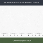 Carmon's Quilt Shop Stonehenge Basics white textured cotton fabric by Northcott with a ruler for scale