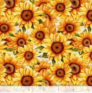 Carmon's Quilt Shop 108-inch wide cotton fabric featuring a packed sunflower pattern on a white background.