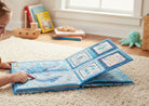 Carmon's Quilt Shop Swim with Me fabric book panel featuring blue underwater illustrations for children's quilts