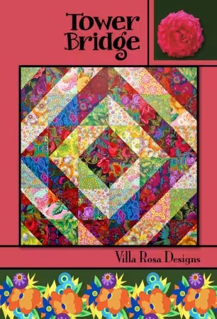 Carmon's Quilt Shop Tower Bridge quilt pattern by Villa Rosa Designs featuring a vibrant central diamond design