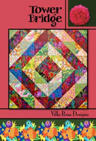 Carmon's Quilt Shop Tower Bridge quilt pattern by Villa Rosa Designs featuring a vibrant central diamond design