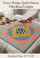 Carmon's Quilt Shop Tower Bridge quilt pattern featuring a central diamond design with multicolored fabric strips