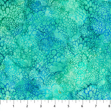 Carmon's Quilt Shop Northcott Coral Reef turquoise bubble print cotton fabric with an ocean-inspired pattern.