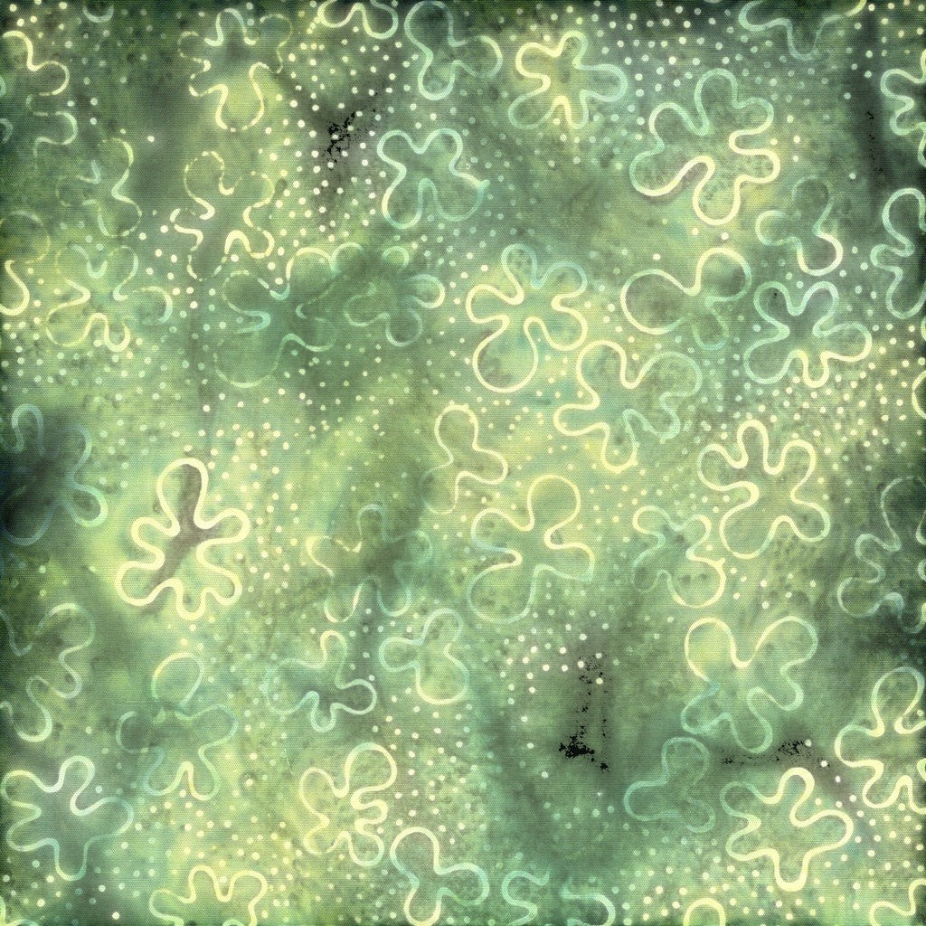 Carmon's Quilt Shop Vintner's Treasure Island Batik fabric featuring a green and purple floral pattern