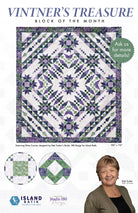 Carmon's Quilt Shop Vintner's Treasure Island Batik quilt featuring a purple and green starburst design by Deb Tucker