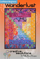 Carmon's Quilt Shop Wanderlust quilt pattern featuring a modern Courthouse Steps design with vibrant floral fabrics.