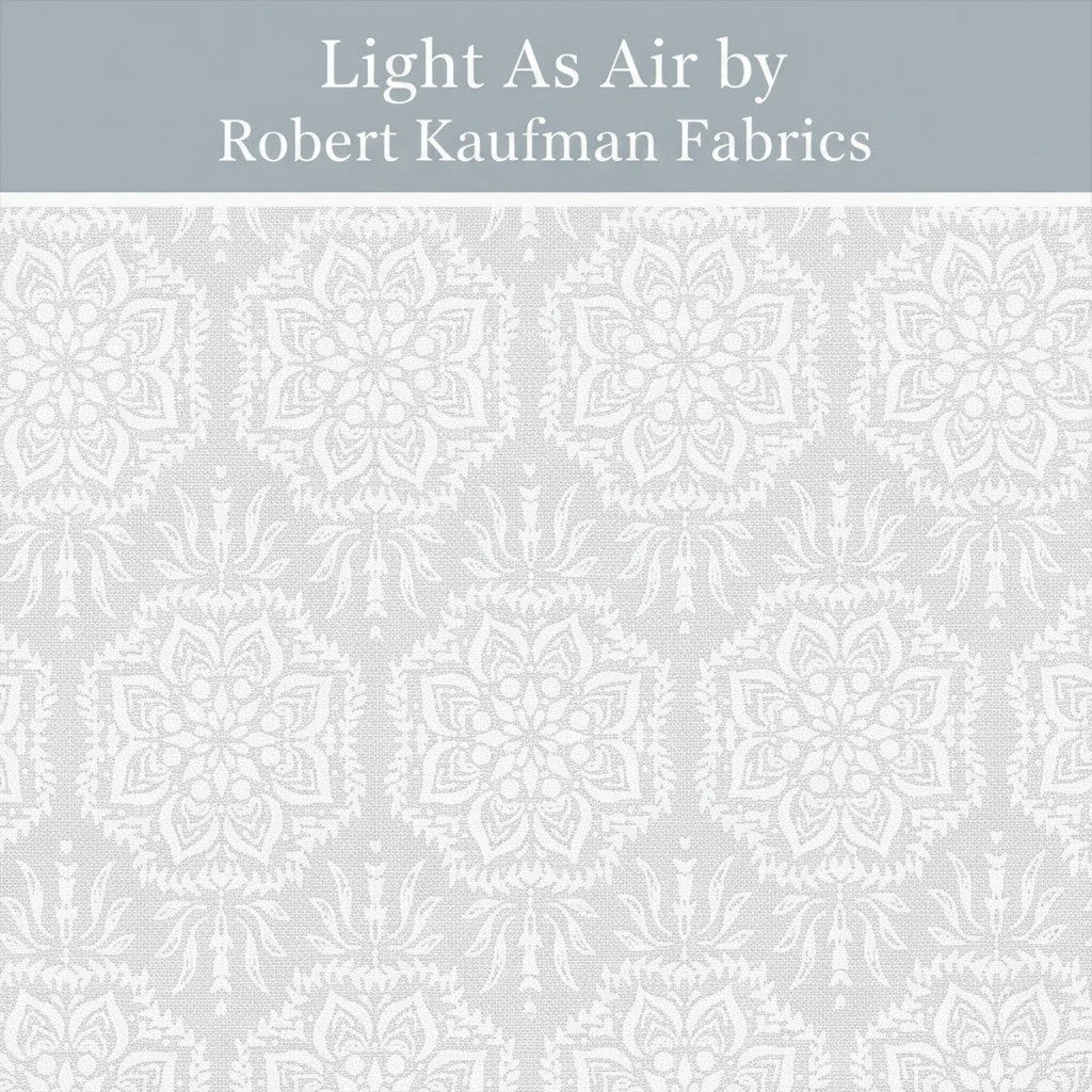 Carmon's Quilt Shop Light As Air white 100% cotton quilting fabric with an elegant airy floral pattern