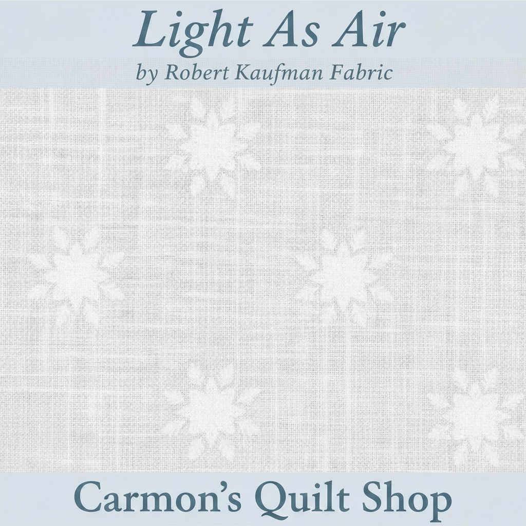 Carmon's Quilt Shop white Light As Air Robert Kaufman 100% cotton quilting fabric with subtle snowflake pattern