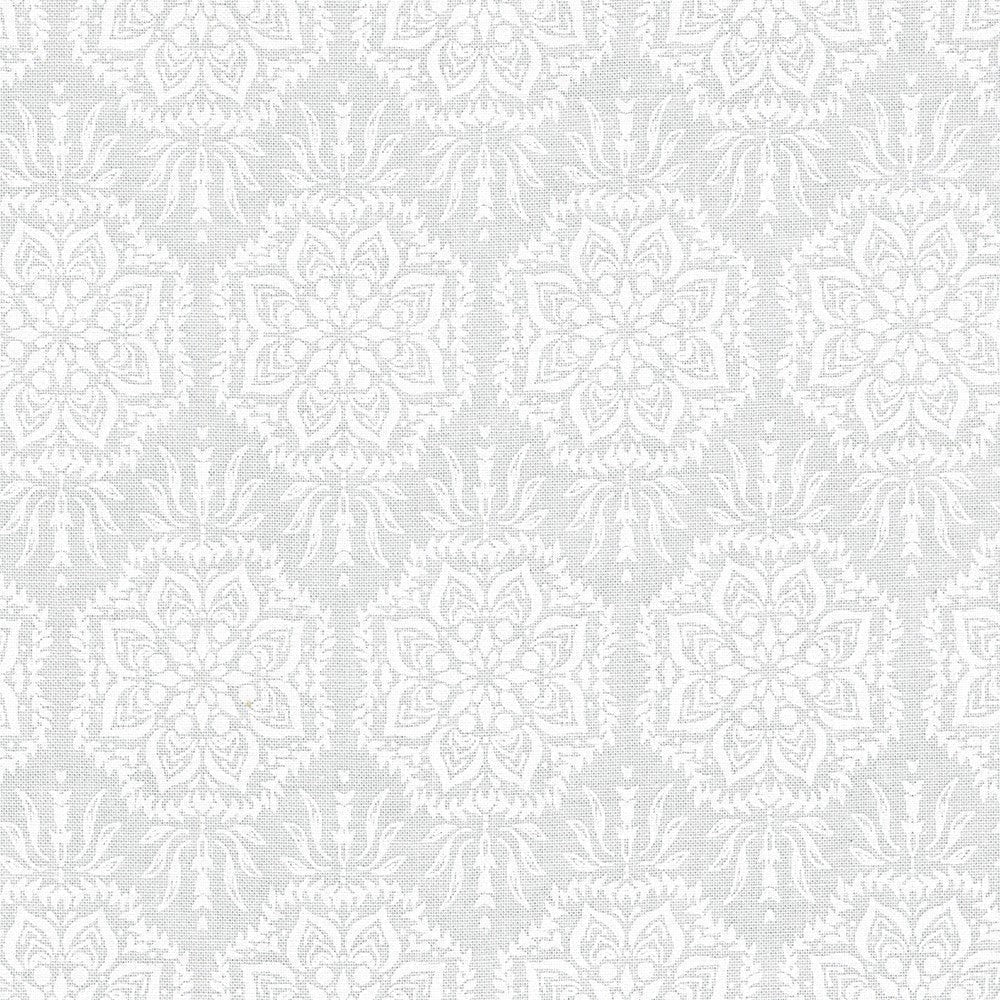 Carmon's Quilt Shop white 100% cotton quilting fabric with an elegant airy floral pattern from Robert Kaufman