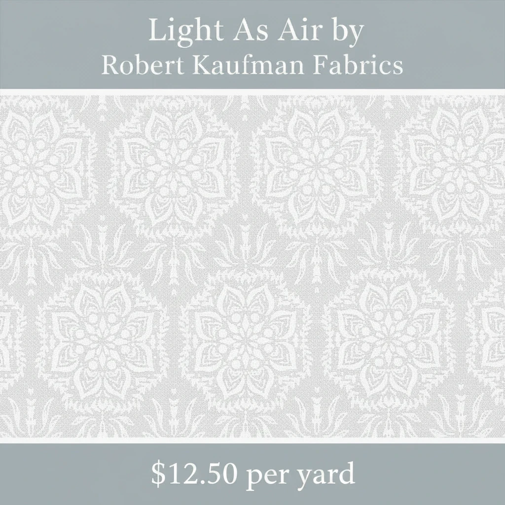 Carmon's Quilt Shop white Robert Kaufman Light As Air cotton fabric with an elegant floral medallion pattern