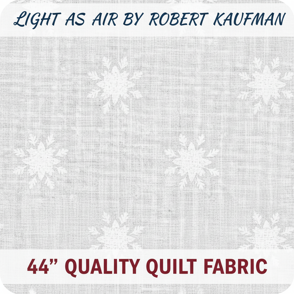 Carmon's Quilt Shop Light As Air white cotton fabric by Robert Kaufman featuring a delicate snowflake pattern.